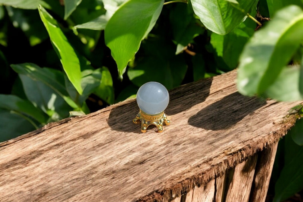 Aquamarijn blauwe bol met houdertje 1cm