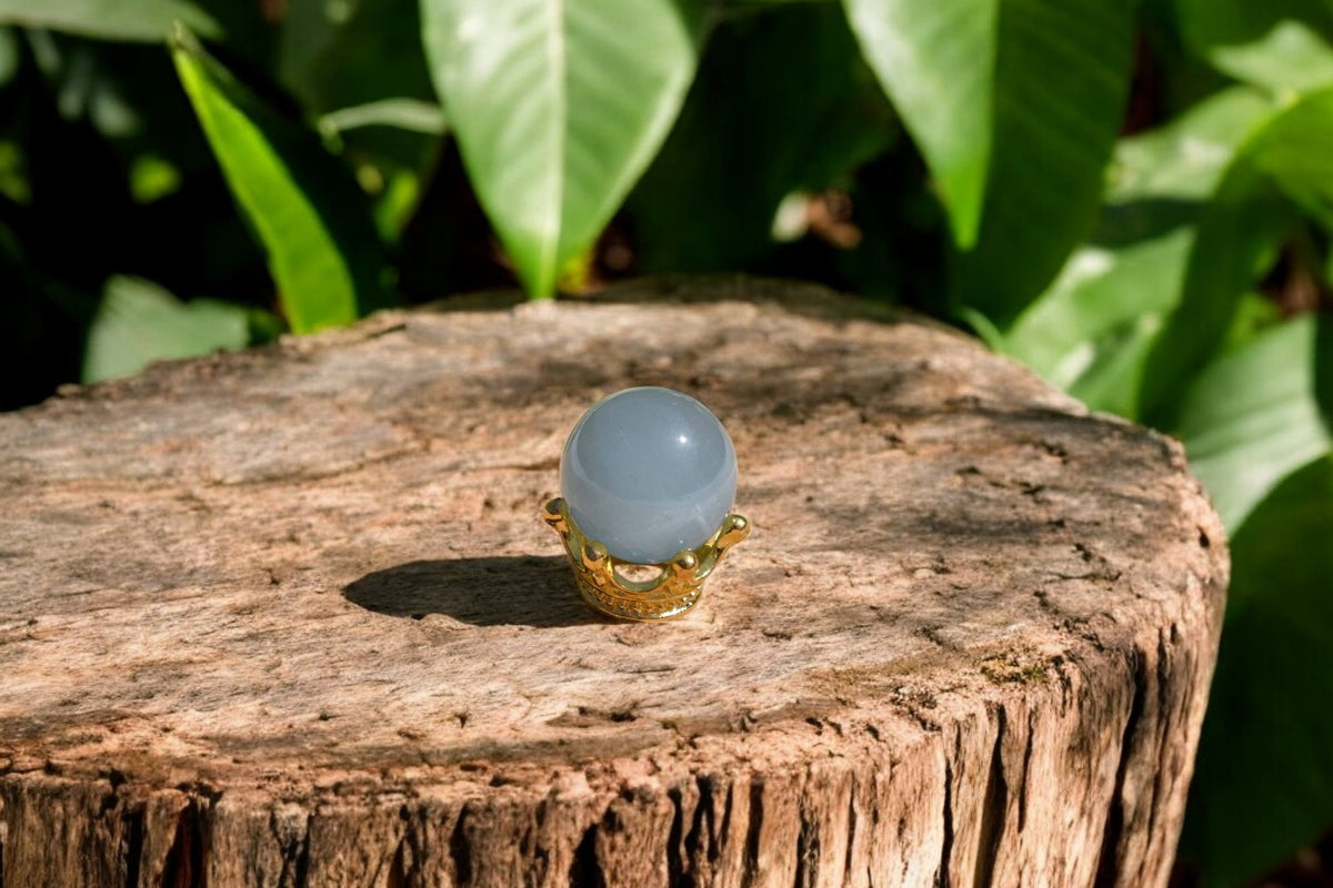 Aquamarijn blauwe bol met houdertje 1cm